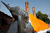 Ayutthaya, Thailand. Wat Yai Chai Mongkhon, 7m- long reclining Buddha, draped in a long orange robe. 